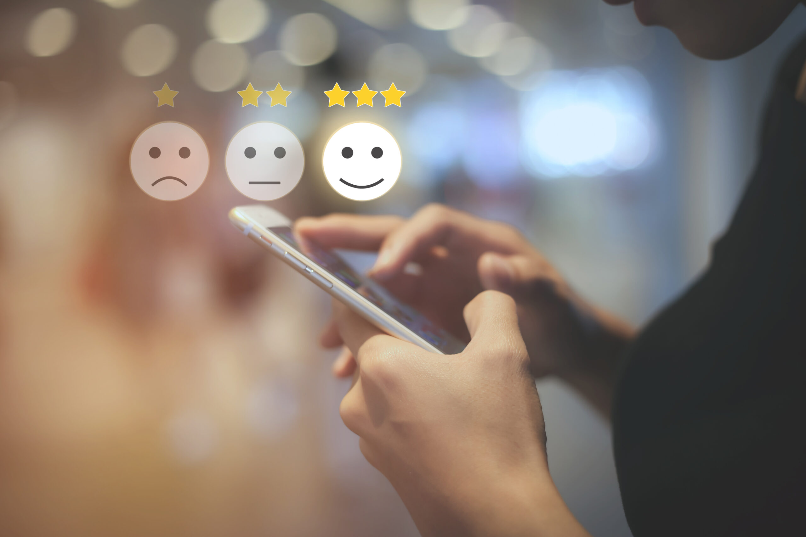Business woman use mobilepressing smiley face touch screen